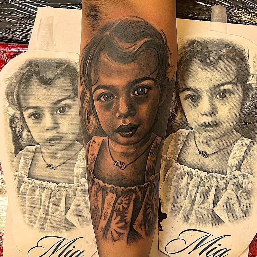 Black and gray realism portrait tattoo